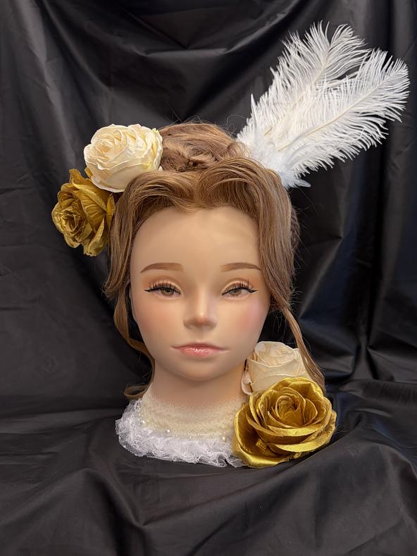 金と羽を纏った貴婦人